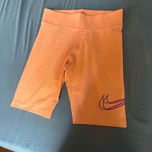 Pink Nike biker shorts